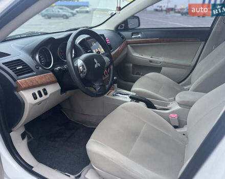 Белый Мицубиси Лансер, объемом двигателя 1.5 л и пробегом 314 тыс. км за 6500 $, фото 21 на Automoto.ua