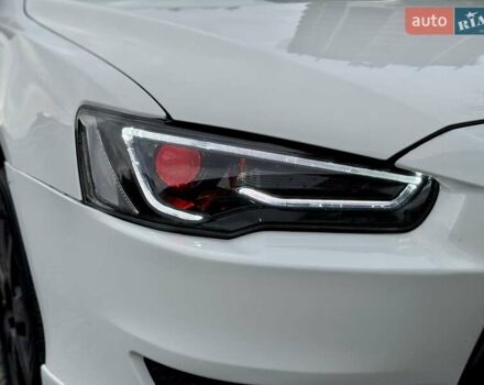 Білий Міцубісі Lancer, об'ємом двигуна 2 л та пробігом 170 тис. км за 6900 $, фото 4 на Automoto.ua