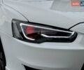 Білий Міцубісі Lancer, об'ємом двигуна 2 л та пробігом 170 тис. км за 6900 $, фото 4 на Automoto.ua