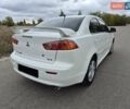 Міцубісі Lancer 2007 у Павлограде на Automoto.ua Білий Міцубісі Lancer, об'ємом двигуна 2 л та пробігом 62 тис. км за 7200 $, фото 3 на Automoto.ua