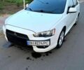 Белый Мицубиси Лансер, объемом двигателя 2 л и пробегом 200 тыс. км за 7500 $, фото 1 на Automoto.ua