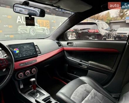 Білий Міцубісі Lancer, об'ємом двигуна 2 л та пробігом 170 тис. км за 6900 $, фото 15 на Automoto.ua