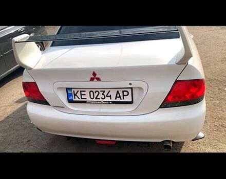 Білий Міцубісі Lancer, об'ємом двигуна 1.6 л та пробігом 250 тис. км за 4700 $, фото 3 на Automoto.ua