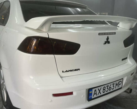 Білий Міцубісі Lancer, об'ємом двигуна 2 л та пробігом 250 тис. км за 6800 $, фото 3 на Automoto.ua