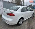 Белый Мицубиси Лансер, объемом двигателя 2 л и пробегом 260 тыс. км за 6700 $, фото 3 на Automoto.ua
