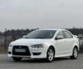 Білий Міцубісі Lancer, об'ємом двигуна 2 л та пробігом 215 тис. км за 7700 $, фото 7 на Automoto.ua