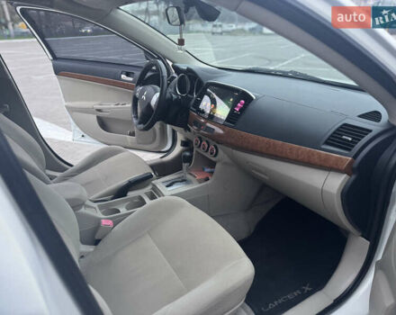 Белый Мицубиси Лансер, объемом двигателя 1.5 л и пробегом 314 тыс. км за 6500 $, фото 18 на Automoto.ua