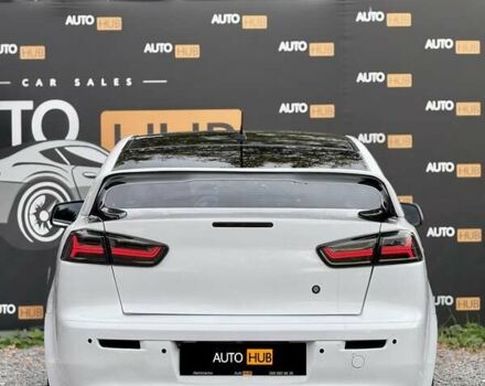 Білий Міцубісі Lancer, об'ємом двигуна 2 л та пробігом 170 тис. км за 6900 $, фото 6 на Automoto.ua
