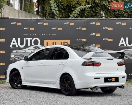 Білий Міцубісі Lancer, об'ємом двигуна 2 л та пробігом 170 тис. км за 6900 $, фото 5 на Automoto.ua