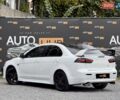 Білий Міцубісі Lancer, об'ємом двигуна 2 л та пробігом 170 тис. км за 6900 $, фото 5 на Automoto.ua