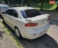 Білий Міцубісі Lancer, об'ємом двигуна 2 л та пробігом 190 тис. км за 4700 $, фото 1 на Automoto.ua