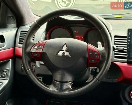 Білий Міцубісі Lancer, об'ємом двигуна 2 л та пробігом 170 тис. км за 6900 $, фото 16 на Automoto.ua