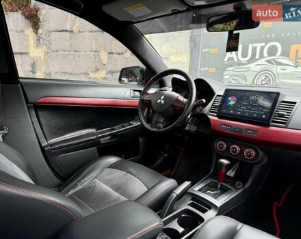 Білий Міцубісі Lancer, об'ємом двигуна 2 л та пробігом 170 тис. км за 6900 $, фото 13 на Automoto.ua