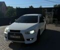 Білий Міцубісі Lancer, об'ємом двигуна 2 л та пробігом 250 тис. км за 5700 $, фото 1 на Automoto.ua