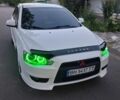 Белый Мицубиси Лансер, объемом двигателя 2 л и пробегом 180 тыс. км за 6750 $, фото 1 на Automoto.ua