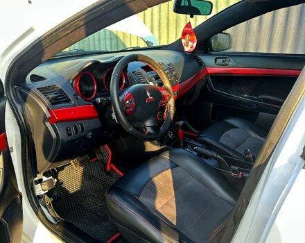 Білий Міцубісі Lancer, об'ємом двигуна 2 л та пробігом 165 тис. км за 5800 $, фото 7 на Automoto.ua