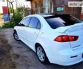 Білий Міцубісі Lancer, об'ємом двигуна 2 л та пробігом 226 тис. км за 7500 $, фото 4 на Automoto.ua