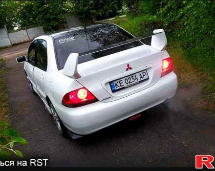 Білий Міцубісі Lancer, об'ємом двигуна 1.6 л та пробігом 250 тис. км за 4700 $, фото 1 на Automoto.ua