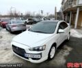 Білий Міцубісі Lancer, об'ємом двигуна 2 л та пробігом 22400 тис. км за 7400 $, фото 1 на Automoto.ua