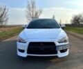 Білий Міцубісі Lancer, об'ємом двигуна 2 л та пробігом 165 тис. км за 5800 $, фото 1 на Automoto.ua
