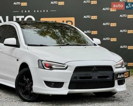 Білий Міцубісі Lancer, об'ємом двигуна 2 л та пробігом 170 тис. км за 6900 $, фото 3 на Automoto.ua