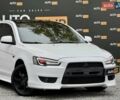 Білий Міцубісі Lancer, об'ємом двигуна 2 л та пробігом 170 тис. км за 6900 $, фото 3 на Automoto.ua