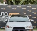 Білий Міцубісі Lancer, об'ємом двигуна 2 л та пробігом 170 тис. км за 6900 $, фото 1 на Automoto.ua