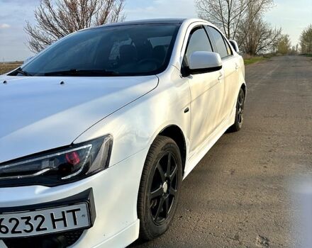 Білий Міцубісі Lancer, об'ємом двигуна 2 л та пробігом 165 тис. км за 5800 $, фото 1 на Automoto.ua