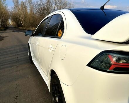 Білий Міцубісі Lancer, об'ємом двигуна 2 л та пробігом 165 тис. км за 5800 $, фото 3 на Automoto.ua