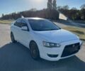 Білий Міцубісі Lancer, об'ємом двигуна 2 л та пробігом 232 тис. км за 6350 $, фото 3 на Automoto.ua