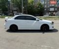 Белый Мицубиси Лансер, объемом двигателя 2 л и пробегом 209 тыс. км за 6250 $, фото 5 на Automoto.ua