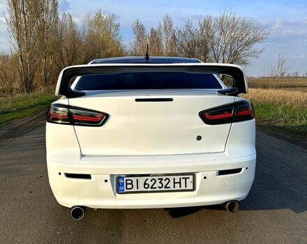 Білий Міцубісі Lancer, об'ємом двигуна 2 л та пробігом 165 тис. км за 5800 $, фото 4 на Automoto.ua