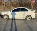 Белый Мицубиси Лансер, объемом двигателя 2 л и пробегом 328 тыс. км за 5200 $, фото 7 на Automoto.ua