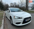 Білий Міцубісі Lancer, об'ємом двигуна 2 л та пробігом 346 тис. км за 5900 $, фото 1 на Automoto.ua