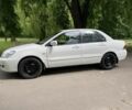 Белый Мицубиси Лансер, объемом двигателя 1.6 л и пробегом 2 тыс. км за 3800 $, фото 6 на Automoto.ua