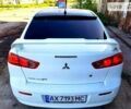 Білий Міцубісі Lancer, об'ємом двигуна 2 л та пробігом 226 тис. км за 7500 $, фото 5 на Automoto.ua