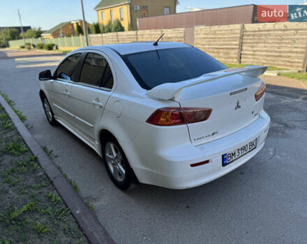 Белый Мицубиси Лансер, объемом двигателя 1.47 л и пробегом 230 тыс. км за 5800 $, фото 4 на Automoto.ua