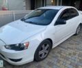 Білий Міцубісі Lancer, об'ємом двигуна 2 л та пробігом 391 тис. км за 6500 $, фото 1 на Automoto.ua