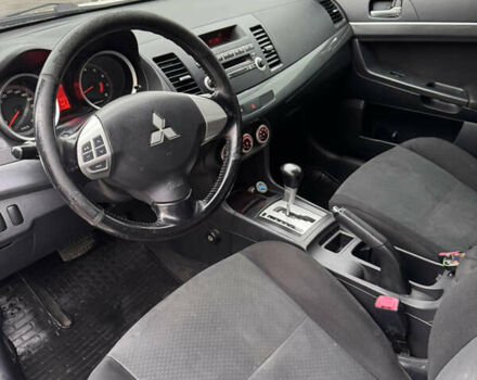 Белый Мицубиси Лансер, объемом двигателя 1.47 л и пробегом 230 тыс. км за 5800 $, фото 21 на Automoto.ua