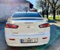 Белый Мицубиси Лансер, объемом двигателя 2 л и пробегом 225 тыс. км за 6850 $, фото 4 на Automoto.ua