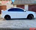 Белый Мицубиси Лансер, объемом двигателя 2 л и пробегом 225 тыс. км за 6850 $, фото 3 на Automoto.ua