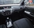 Белый Мицубиси Лансер, объемом двигателя 1.6 л и пробегом 59 тыс. км за 6700 $, фото 45 на Automoto.ua