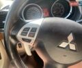Белый Мицубиси Лансер, объемом двигателя 2 л и пробегом 167 тыс. км за 7400 $, фото 41 на Automoto.ua