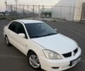 Білий Міцубісі Lancer, об'ємом двигуна 1.6 л та пробігом 213 тис. км за 3204 $, фото 1 на Automoto.ua