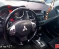 Білий Міцубісі Lancer, об'ємом двигуна 2 л та пробігом 258 тис. км за 6400 $, фото 10 на Automoto.ua
