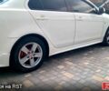 Білий Міцубісі Lancer, об'ємом двигуна 2 л та пробігом 258 тис. км за 6400 $, фото 2 на Automoto.ua