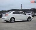 Белый Мицубиси Лансер, объемом двигателя 2 л и пробегом 218 тыс. км за 5555 $, фото 4 на Automoto.ua