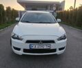 Білий Міцубісі Lancer, об'ємом двигуна 2 л та пробігом 214 тис. км за 6200 $, фото 1 на Automoto.ua