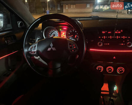 Белый Мицубиси Лансер, объемом двигателя 2 л и пробегом 220 тыс. км за 6000 $, фото 14 на Automoto.ua