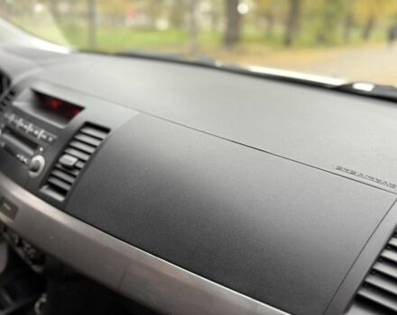 Белый Мицубиси Лансер, объемом двигателя 1.5 л и пробегом 265 тыс. км за 5600 $, фото 13 на Automoto.ua